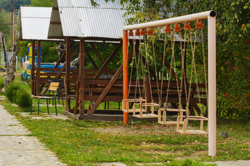 Fototapeta na wymiar Children's playground in the center of the city in western Ukraine
