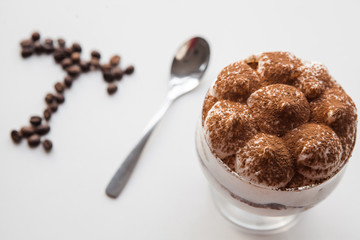 Delicious tiramisu and coffee beans