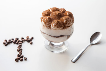 Delicious tiramisu and coffee beans