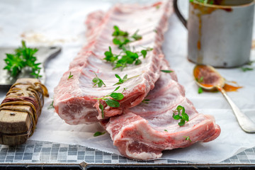 Seasoning fresh ribs in the summer garden