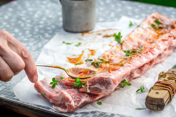 Preparing fresh ribs in the summer garden