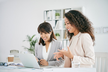 Colleagues with laptop