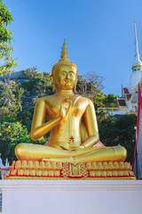 The outdoor Gold Buddha statue.