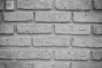 Grey old brick wall background.