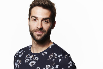 Fototapeta premium Portrait of man wearing floral t-shirt