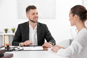 Young woman at notary public office
