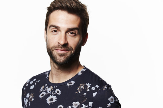 Portrait of man wearing floral t-shirt