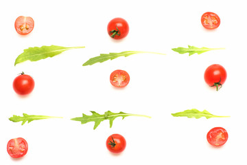 fresh vegetable, cherry tomato and green arugula isolated on white