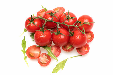 fresh vegetable, cherry tomato and green arugula isolated on white