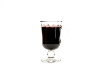 Glass of red hot mulled wine isolated on white background