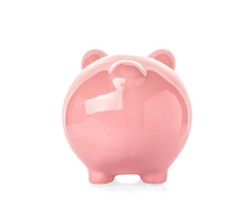 Pink ceramic piggy bank on white background