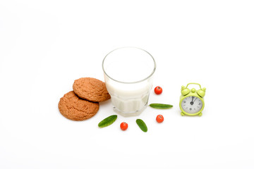 Cup of milk and cookies isolated on white background