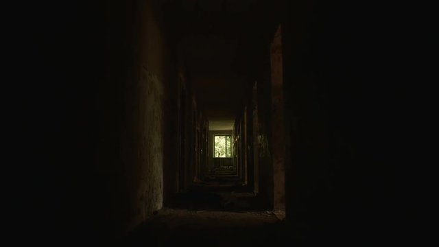 Corridor in the abandoned house. Smooth and slow steady cam shot