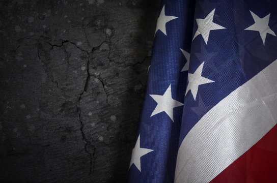 USA flag on dark grunge concrete background