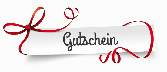 Fototapeta na wymiar Gutschein - Papierzettel mit rotem Band