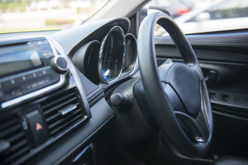Obraz na płótnie Canvas Steering wheel in the car