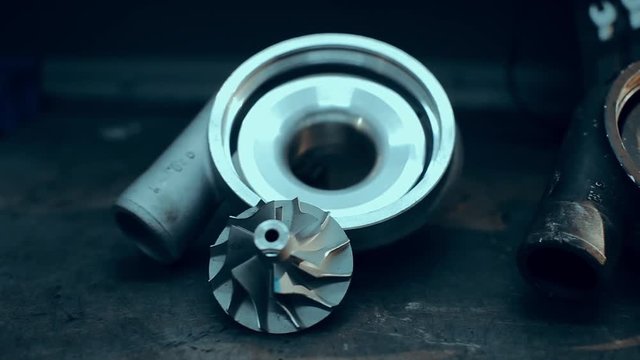 Old and new turbocharger in the garage