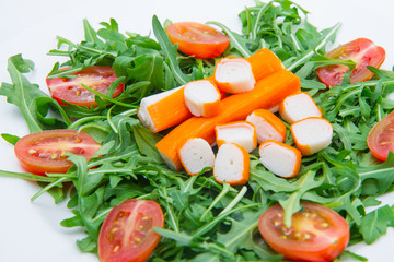 surimi with rocket and cherry tomatoes