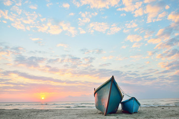 Blue boats on beach