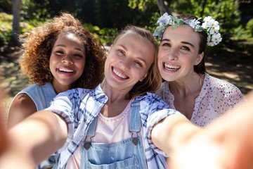 Female friends having fun in park