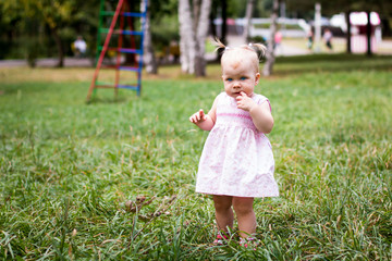Small cute baby outdoors in the park