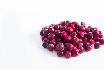 .Frozen cherries on a white background