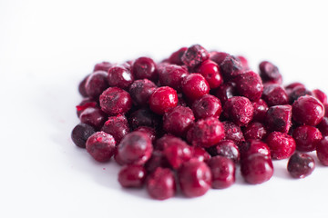 .Frozen cherries on a white background