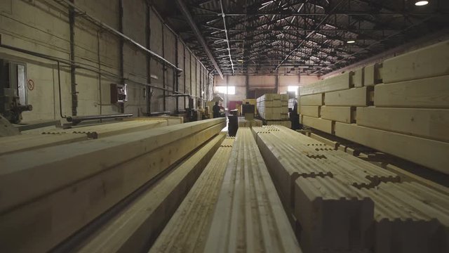 LVL glued Lumbe. Engineered stress rating product made by bonding together separate pieces of wood, having a nominal thickness of 2 inches or less. Production of laminated veneer lumber.