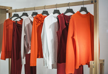 Women clothes on racks in a store in London.