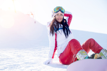 Fototapeta na wymiar Girl in glasses with snowboard