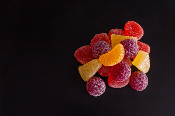 .Bright tasty marmalade on a white background