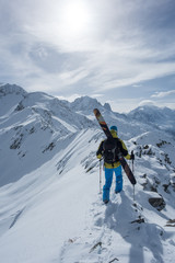 Naklejka na ściany i meble Skiers hike along the Ridge together in Chamonix, France