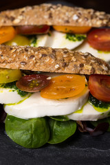 Healthy Vegetarian Sandwich with Baby Spinach, Mozzarella Cheese and Grape Tomatoes