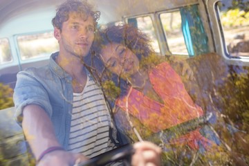 Couple travelling in campervan