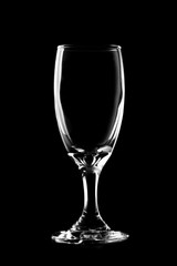 Glass of wine on black background.