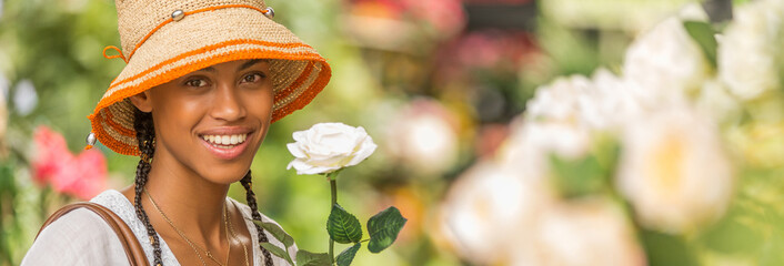 Obraz premium beautiful black girl with hat in garden