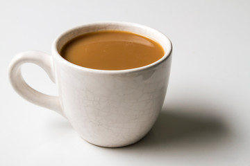 Cup of coffee on white background.