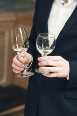 people consider the color of the wine and try how it smells in different glasses