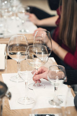 people consider the color of the wine and try how it smells in different glasses