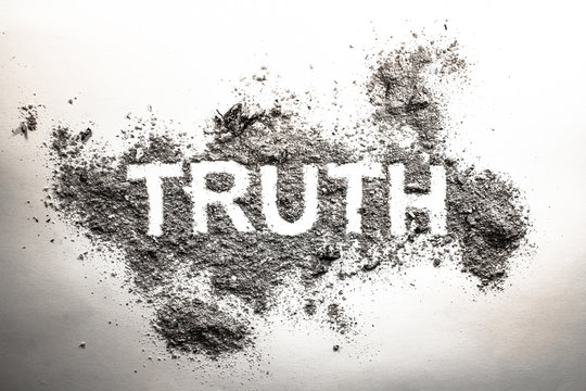 Truth word written in ash, dust, dirt or filth as a cynical concept of lie or post truth in society, politics