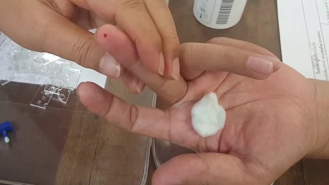 blood checking on finger before donation or blood checking background