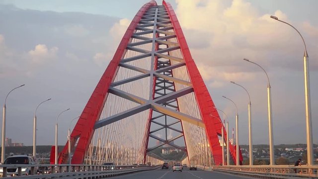 Amazing bridge over water. Transportation traffic in slow motion on sunny summer day. 1920x1080
