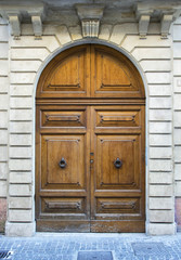  Wooden door in an old Italian house in Florence.