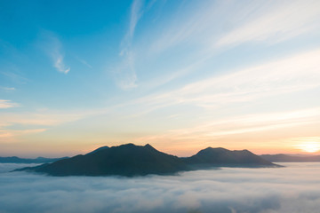 Sunshine on the morning mist at Phu Thok, Loei, Thailand.