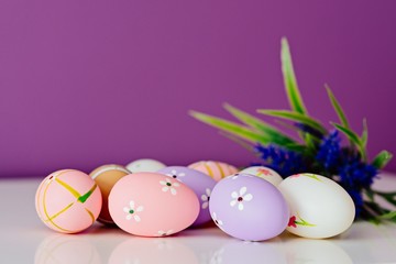 Easter card, spring decoration with blue flowers and eggs