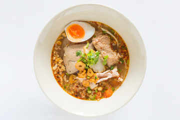 Spicy tom yum noodle with pork