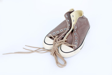 Pair of new sneakers isolated on white background, vintage style image