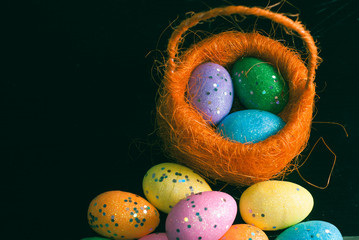 Decorative Easter eggs in a basket,