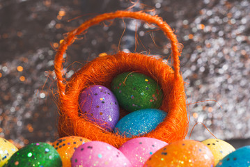 Decorative Easter eggs in a basket,