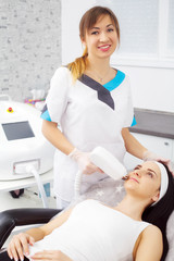 Body Care. Laser Hair Removal. Beautician Removing Hair Of Young Woman's Armpit. Laser Epilation Treatment In Cosmetic Beauty Clinic. Hairless Smooth And Soft Skin. Health And Beauty Concept.